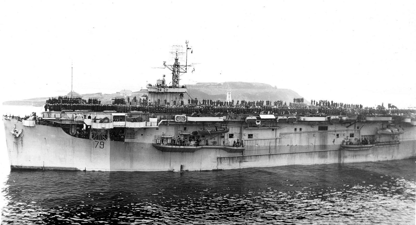 HMS Puncher heading for the UK with a full ferry load of US Lend-Lease aircraft