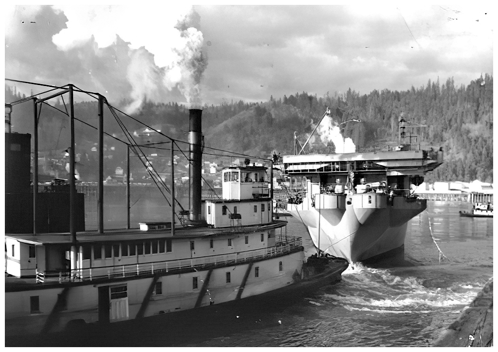 HMS Tracker manoeuvres in the Willamette River with the aid of a river tug, before beginning acceptance trials in the Colombia River in early February 1943