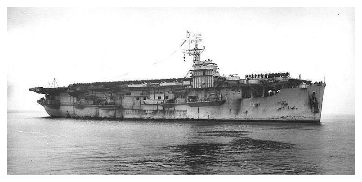 HMS PATROLLER on her return to the UK in October 1946 flying her paying off pennant with members of the crew line the flight deck in the traditional act of ‘dressing ship’ for entering harbour. Photo: Author’s collection.